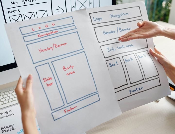 designers-discussing-website-layouts-2023-11-27-05-05-35-utc-1.jpg